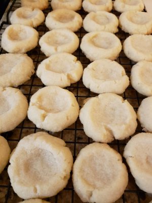 Holiday Pecan Thumbprint Cookies Recipe, Pecan thumbprint cookies fresh out of the oven before the pecan pie filling goes into them