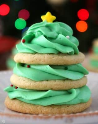 Stacked Christmas Tree Cookie Recipe! This easy stacked Christmas tree cookie recipe is an awesome holiday party dessert or fun activity for the family! Check out this EASY recipe now!