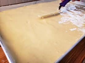 Cake batter ready to go into the oven for handheld Christmas cakes #DuncanHinesHoliday