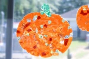 Orange pumpkin suncatchers made using beads
